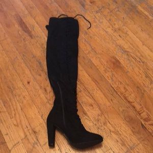 Black thigh high boots that tie up